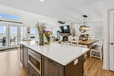 Welcome to 246 W Bay Drive, a stunning waterfront retreat in the - photo 18