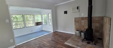 This cozy 1-bed, 1-bath updated camp house offers a serene - photo 8