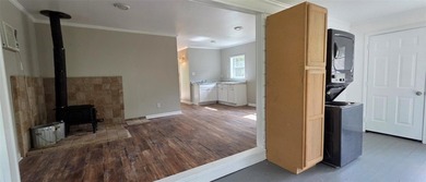 This cozy 1-bed, 1-bath updated camp house offers a serene - photo 10