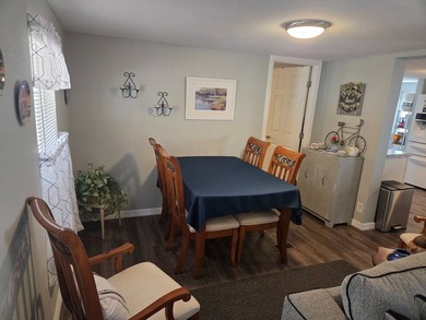 Please Note: This home is located on leased land and does not - photo 5