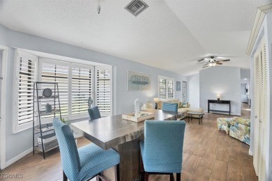 Discover effortless coastal charm in this rare end-unit villa