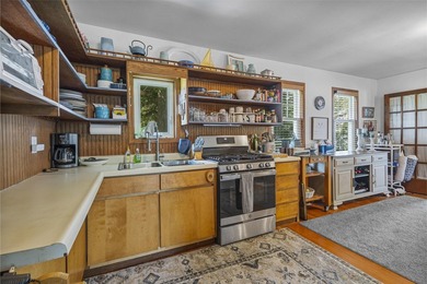 Lakefront living at this charming 2-bedroom, 1-bath cottage - photo 11