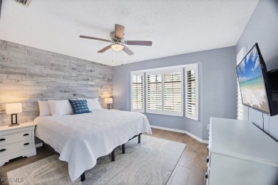 Discover effortless coastal charm in this rare end-unit villa