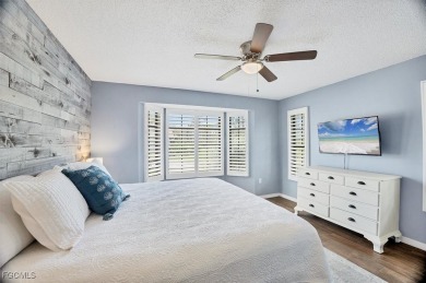 Discover effortless coastal charm in this rare end-unit villa