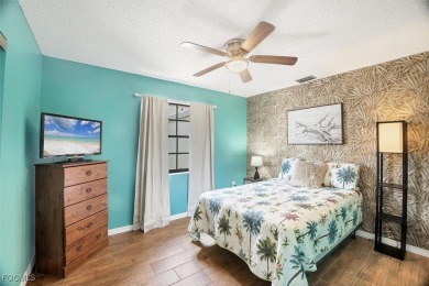 Discover effortless coastal charm in this rare end-unit villa