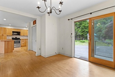 Nestled on a large private lot, this unique contemporary home - photo 8