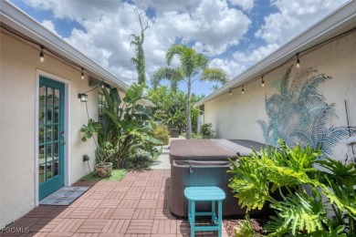 Discover effortless coastal charm in this rare end-unit villa