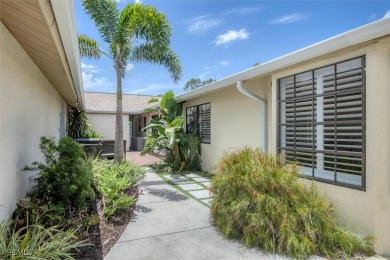 Discover effortless coastal charm in this rare end-unit villa