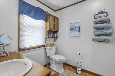 Lakefront living at this charming 2-bedroom, 1-bath cottage - photo 26