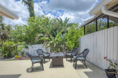 Discover effortless coastal charm in this rare end-unit villa