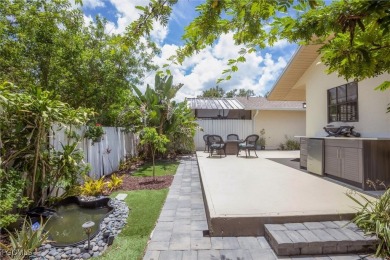 Discover effortless coastal charm in this rare end-unit villa