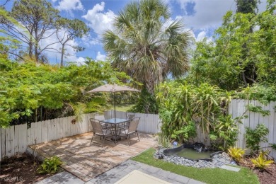 Discover effortless coastal charm in this rare end-unit villa