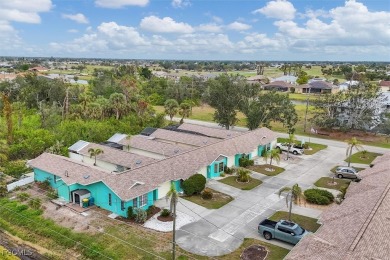 Discover effortless coastal charm in this rare end-unit villa