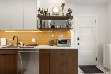 This spacious condo blends historic charm with thoughtful modern - photo 1