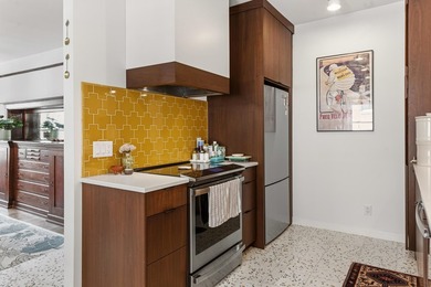 This spacious condo blends historic charm with thoughtful modern - photo 4