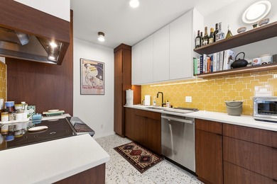 This spacious condo blends historic charm with thoughtful modern - photo 6