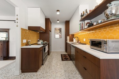 This spacious condo blends historic charm with thoughtful modern - photo 7