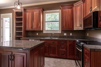 Beautifully Maintained one owner Brick Home in the highly - photo 10