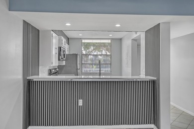 Beautifully upgraded condo offering modern finishes and - photo 13