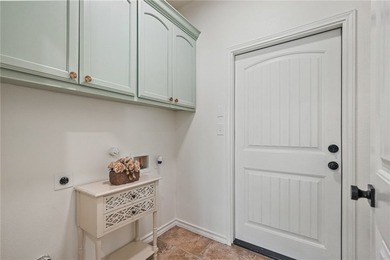 Tucked away on a quiet cul-de-sac in a gated community, this - photo 16