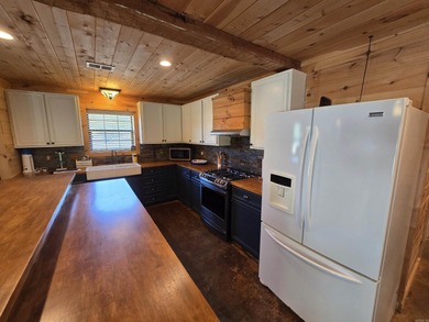 Introducing your dream lakefront getaway! This stunning, fully - photo 18