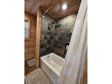 Introducing your dream lakefront getaway! This stunning, fully - photo 26