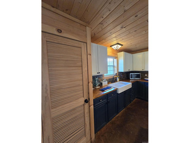Introducing your dream lakefront getaway! This stunning, fully - photo 38