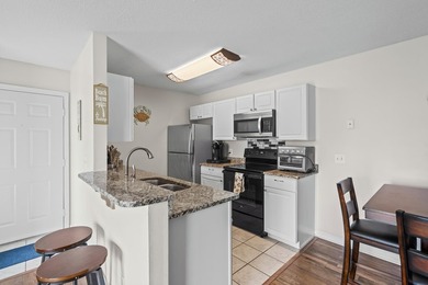 Welcome to this charming 2-bedroom, 2-bathroom condo located - photo 12