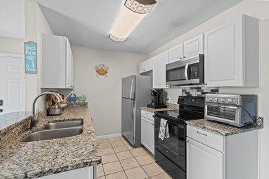 Welcome to this charming 2-bedroom, 2-bathroom condo located - photo 13