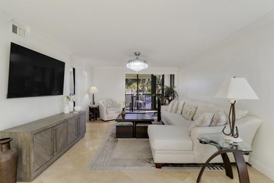 Look No Further! Rarely available 3BR/2BA top-floor end unit in