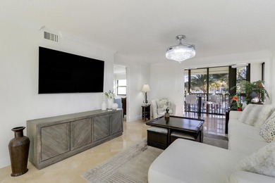 Look No Further! Rarely available 3BR/2BA top-floor end unit in