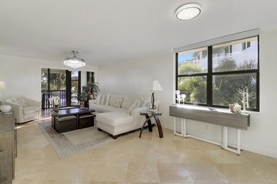 Look No Further! Rarely available 3BR/2BA top-floor end unit in