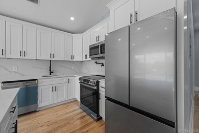 241-49-148th Drive is a meticulously renovated two family tucked - photo 8