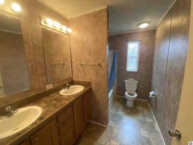 Check out this affordable home. Hardly lived in over the years - photo 22