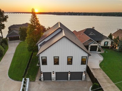 Welcome to this stunning gated 3-bedroom, 3-bathroom lake home - photo 1