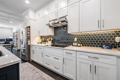 Discover refined waterfront living in the coveted gated - photo 4
