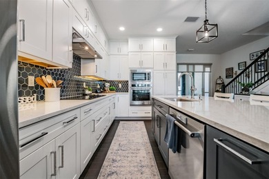 Discover refined waterfront living in the coveted gated - photo 5