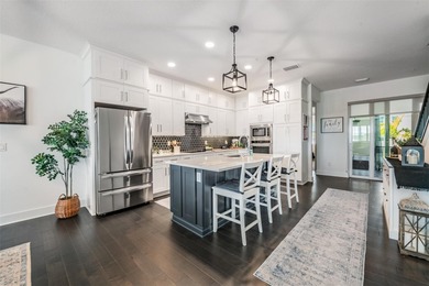 Discover refined waterfront living in the coveted gated - photo 7