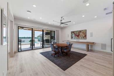 Welcome to this stunning gated 3-bedroom, 3-bathroom lake home - photo 8