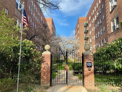 TOP FLOOR unit in the quiet gated community of Cathedral Gardens - photo 1