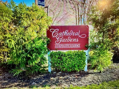 TOP FLOOR unit in the quiet gated community of Cathedral Gardens - photo 3