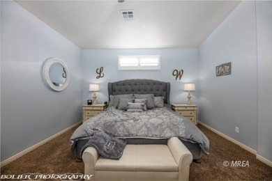 Corner lot with a beautiful home. The front walk way leads up to