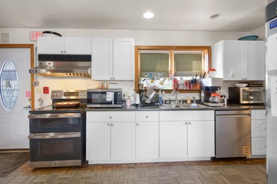 This expansive income-producing property presents a unique