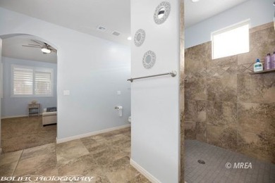 Corner lot with a beautiful home. The front walk way leads up to