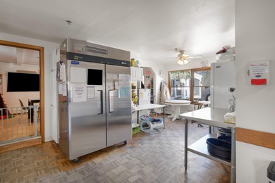 This expansive income-producing property presents a unique