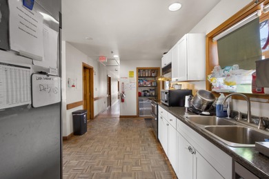 This expansive income-producing property presents a unique