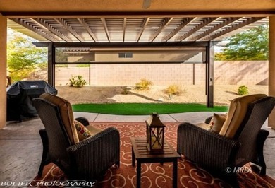 Corner lot with a beautiful home. The front walk way leads up to