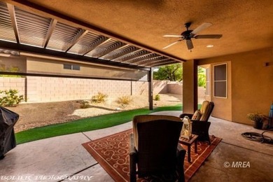 Corner lot with a beautiful home. The front walk way leads up to