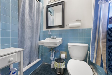 This expansive income-producing property presents a unique