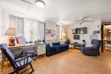 This expansive income-producing property presents a unique